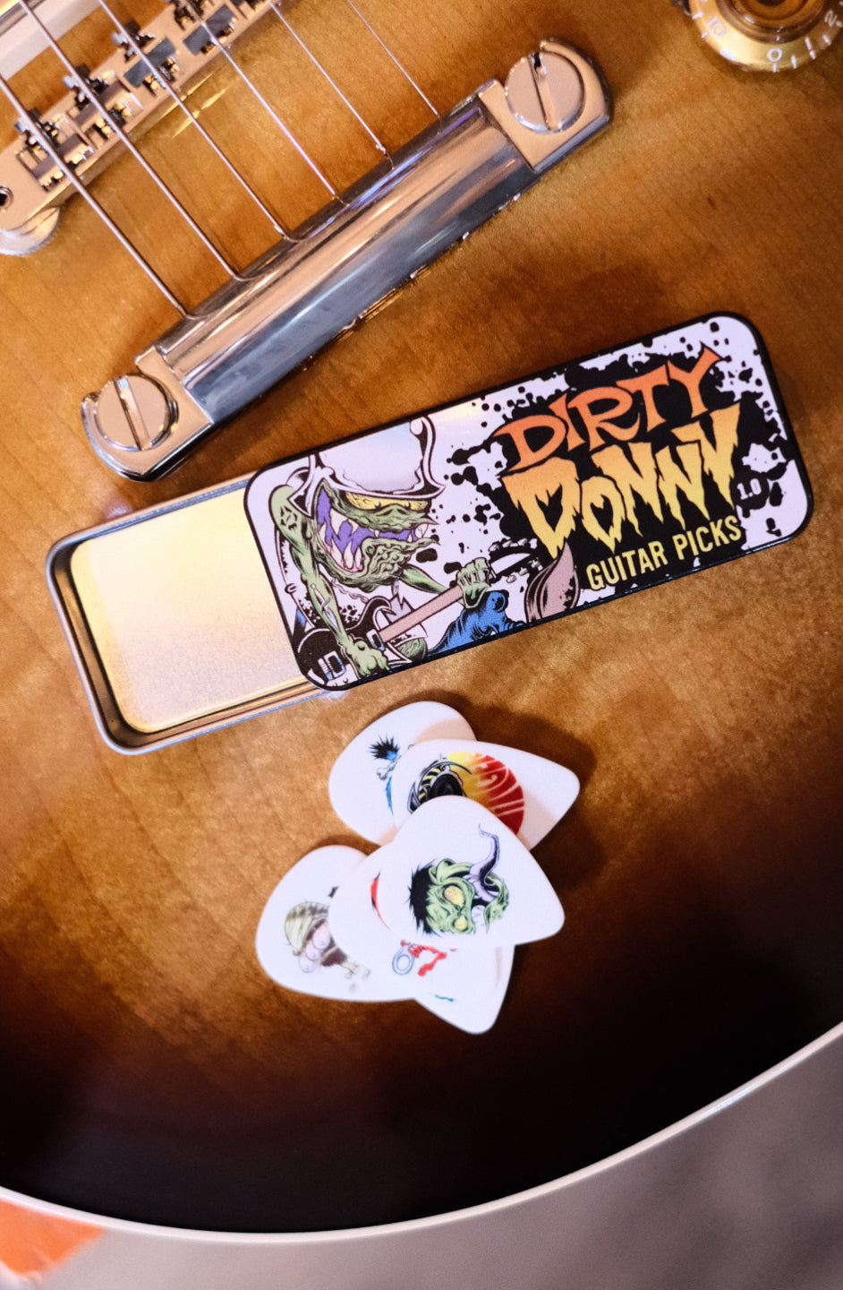 Jim Dunlop Dirty Donny Black Line Art Pick Tin – Music Bros. Ltd